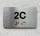 APT# 2C SILVER Braille Sign