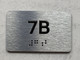 APT# 7B SILVER Compliance Sign