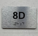 APT# 8D SILVER Braille Sign