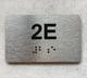 APT# 2E Braille Sign