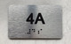 APT# 4A Braille Sign