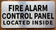 The Fire Alarm Control Panel Located Inside Safety Sign