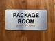 The Package Room Sign with Raised Letters & Grade 2 Compliance Sign