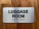 The Luggage Room with Raised Letters & Grade 2 Safety Sign