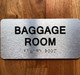 The Baggage Room Ada Sign