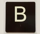 B Sign with Raised Letters Ada Sign