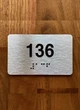 Apartment number 136 Ada Sign