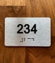 Apartment number 234 Ada Sign