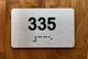 Apartment number 335 Ada Sign