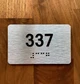 Apartment number 337 Ada Sign