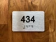 Apartment number 434 Compliance Sign