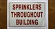 sprinkler-throughout-building-warning-label-7-x-10.jpg