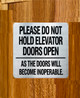silver-please-do-not-hold-elevator-doors-open-as-the-doors-will-become-inoperable-building-notice.jpg