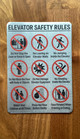 elevator-safety-rules-double-sided-tape-sign.jpg
