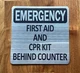 emergency-first-aid-cpr-kit-behing-counter-aluminum-sign-peel-and-stick.jpg