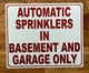 automatic-sprinkler-in-basement-and-garage-only-white-safety-sign.jpg