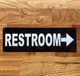 restroom-arrow-right-4x12-mounting-holes.jpg