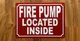 fire-pump-located-inside-red-safety-sign.jpg