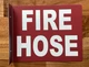 fire-hose-3d-projection-hallway-7x10-building-signage.jpg