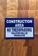 5x7-construction-area-no-tresspassing-violators-will-be-prosecuted-metal-identification-sign.jpg