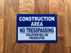 construction-area-no-tresspassing-violators-will-be-prosecuted-aluminum-with-mounting-holes.jpg