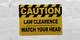 orange-caution-law-clearence-watch-your-head-orange-screw-mount-sign.jpg