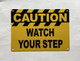 caution-watch-your-step-orange-building-safety-wall-plate.jpg