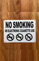 5x7-no-smoking-or-electronic-cigarette-use-metal-identification-sign.jpg