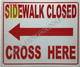 BUILDING SIGNAGE  Sidewalk Closed -cross here left arrow