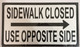 BUILDING SIGNAGE  Sidewalk Closed   USE OPPOSITE SIDE  RIGHT ARROW