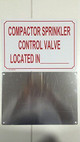 SIGN COMPACTOR SPRINKLER CONTROL VALVE LOCATED IN-SIGN