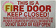 THIS IS A FIRE DOOR KEEP CLOSED SIGNAGE
