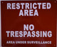 Restricted Area No Trespassing Area Under Surveillance Signage