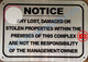 NOTICE ANY LOST DAMAGED OR STOLEN PROPERTIES WITHIN THE PREMISES OF THIS COMPLEX ARE NOT THE RESPONSIBILITY OF THE MANAGEMENT OR OWNER SIGN