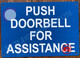 PUSH DOORBELL FOR ASSISTANCE SIGN