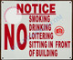 NOTICE NO SMOKING DRINKING LOITERING SITTING IN FRONT OF BUILDING SIGN