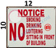 NOTICE NO SMOKING DRINKING LOITERING SITTING IN FRONT OF BUILDING SIGN