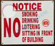 NOTICE NO SMOKING DRINKING LOITERING SITTING IN FRONT OF BUILDING SIGN