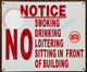 NOTICE NO SMOKING DRINKING LOITERING SITTING IN FRONT OF BUILDING SIGN