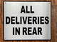 ALL DELIVERIES IN REAR SIGN