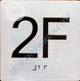 Apartment Number 2F Signage with Braille and Raised Number