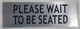Sign Please Wait to BE Seated