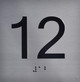 Apartment Number 12 Sign with Braille and Raised Number