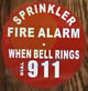 Sprinkler fire Alarm When Bell Rings dial 911 Signage