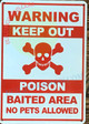 WARNING KEEP OUT POISON BAITED AREA NO PETS ALLOWED