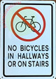 NO Bicycles in HALLWAYS OR ON STAIERS