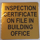 Inspection Certificate on file in Building Office Signage