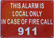 This Alarm is Local ONLY in CASE of FIRE Call 911 Sign