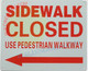 Signage SIDEWALK CLOSED USE PEDESTRIAN WALKWAY ARROW LEFT