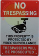 No trespassing this property protected by video surveillance Signage